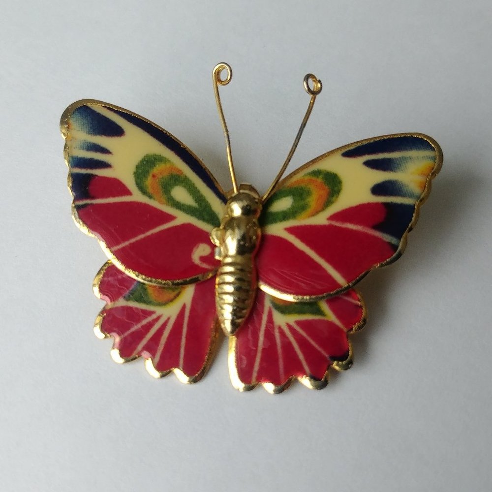 Gold tone butterfly pin pendant
